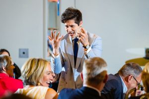 Magician for corporate events – Ben Hanlin connecting with an audience.
