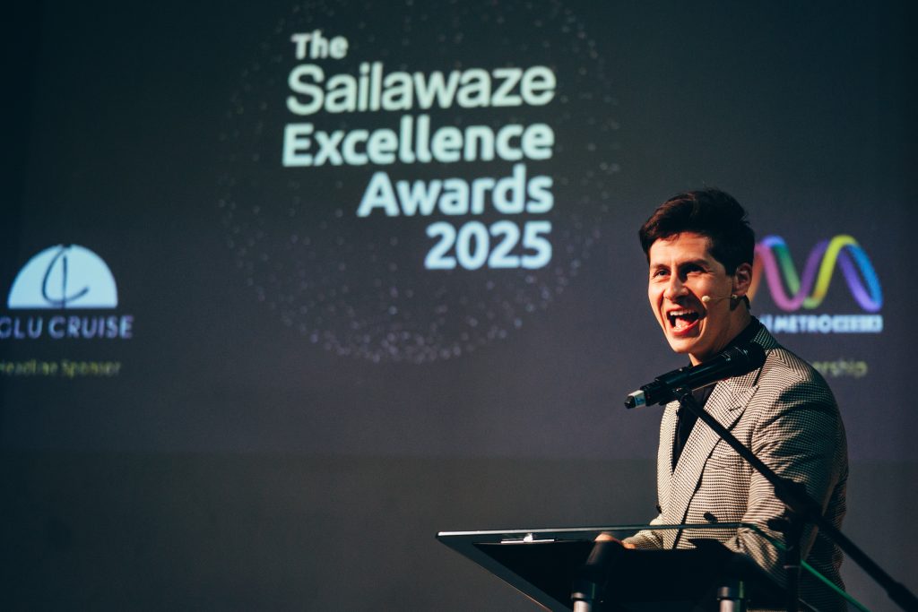 Ben Hanlin awards show host engaging a corporate audience during a live event.