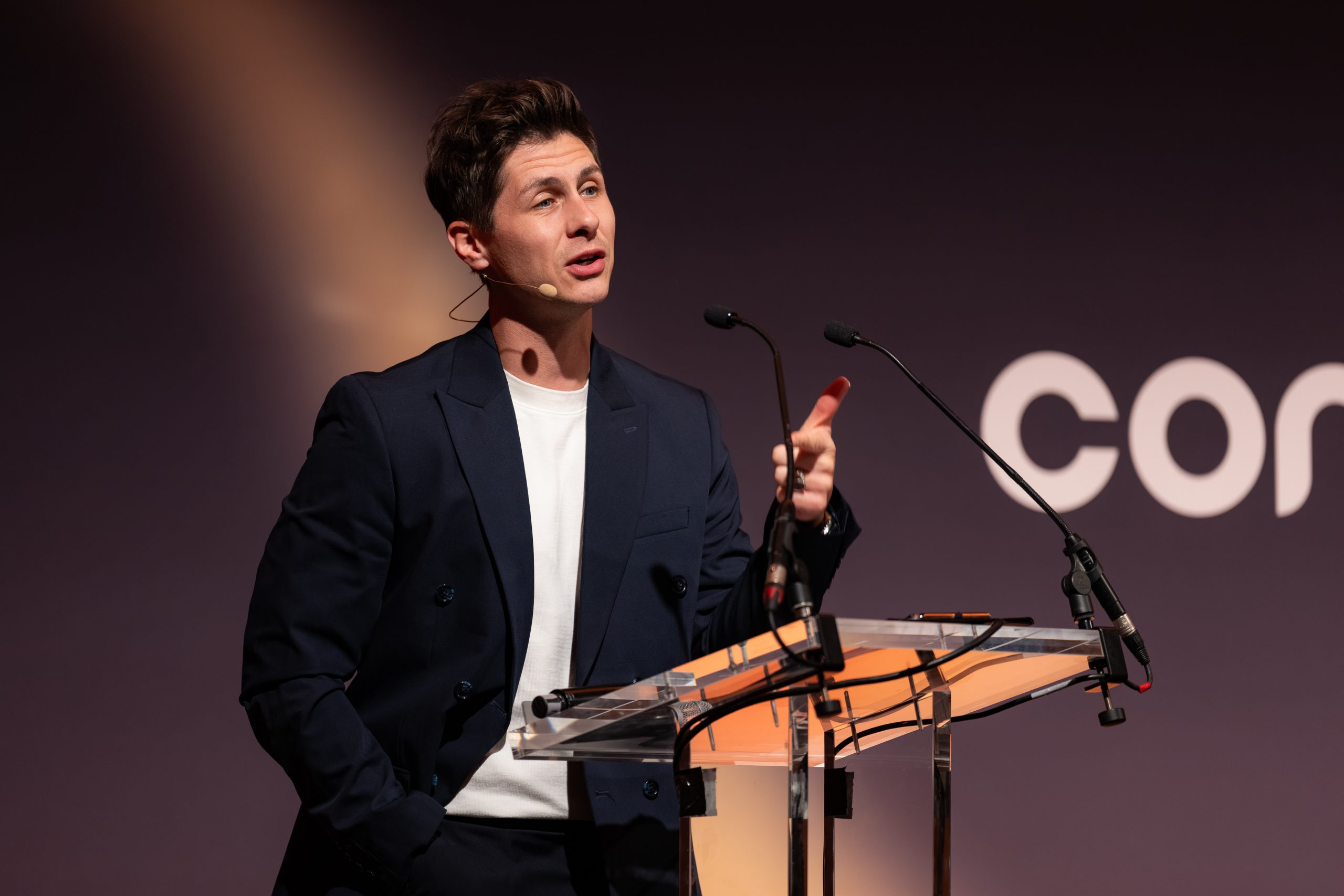 Ben Hanlin delivering a keynote about storytelling in business and business communication skills.