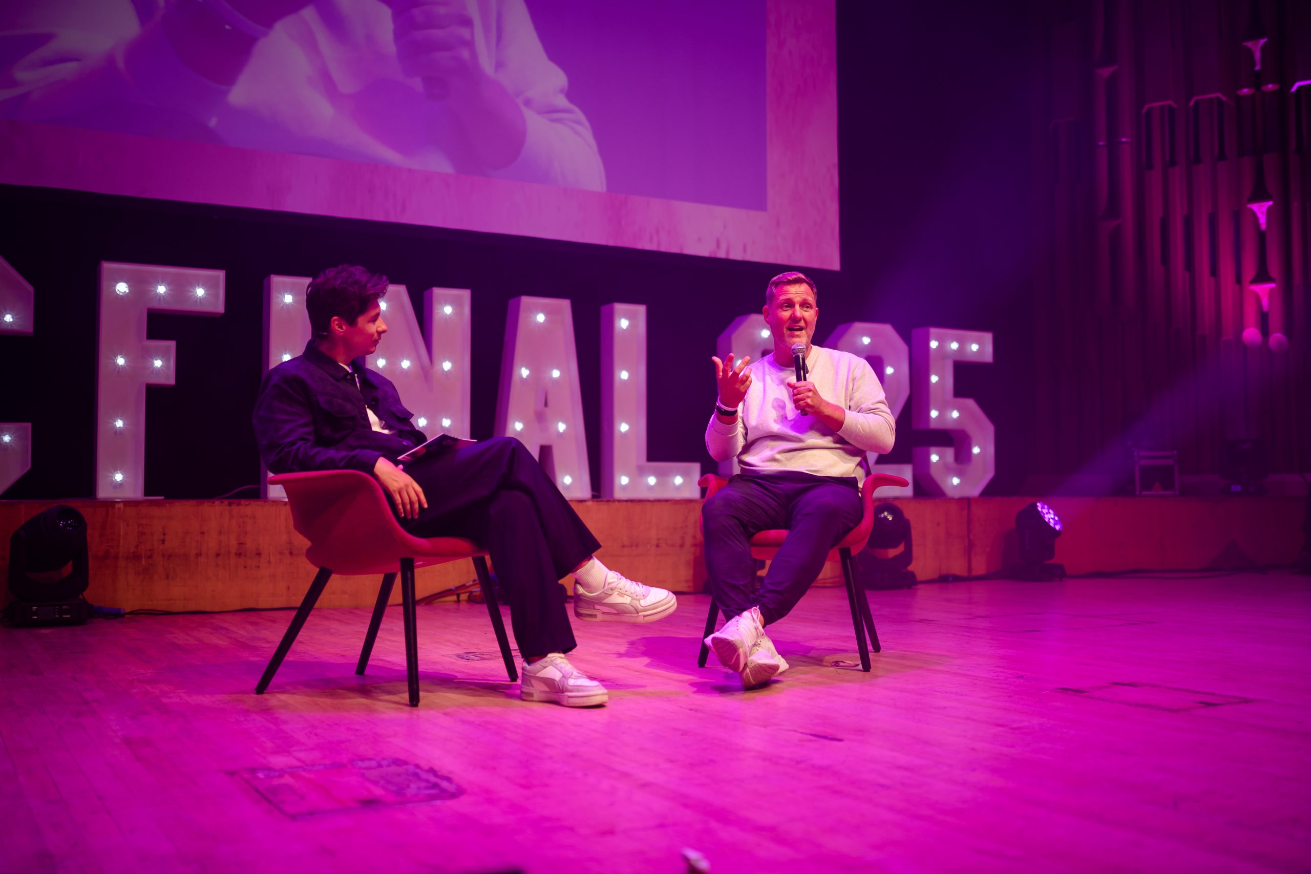 Ben Hanlin listening attentively during a workshop, demonstrating the importance of understanding before speaking.
